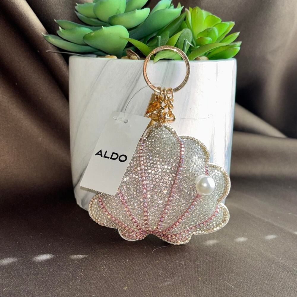 Aldo Seashell Keychain or bag charm 
Brand new with tags
One size